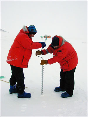 Drilling the sea ice to test the thickness