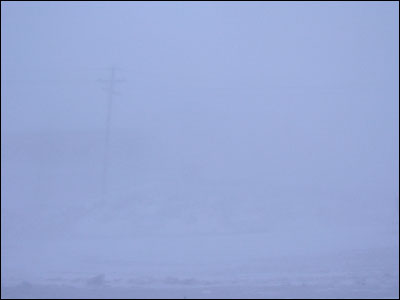 McMurdo in a condition one storm. This photo is the same
          								      as the one before it, but with less visibility
