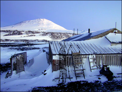 Hut at Cape Evans with Mt. Erebus behind