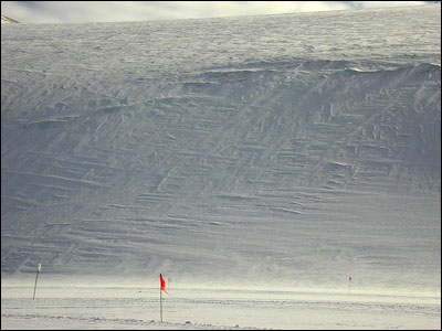 Criss cross pattern in the snow on the mountainside