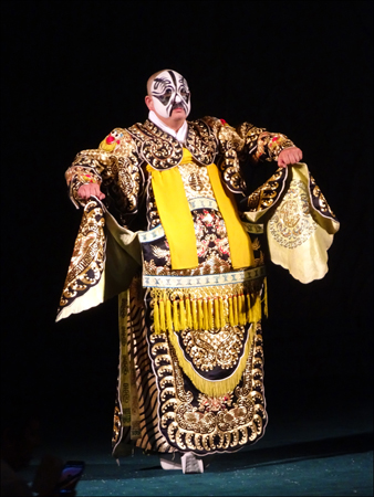 Actor exhibiting makeup and costume at Peking Opera