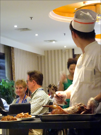Chef preparing the Peking Duck
