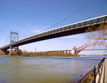 Robert F. Kennedy/Triborough Bridge in front of the Hell Gate Bridge, New York City, New York