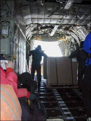 C-130 interior doing a cargo off-load