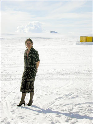 Irma on the ice in a silk dress & high heels